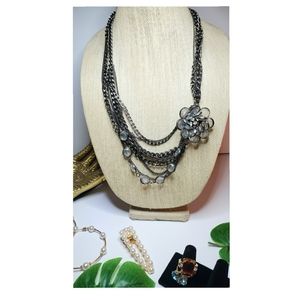 Multi chain statement necklace.